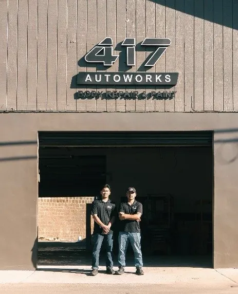 Leo and John standing in front of the 417 Autoworks shop entrance in Wailuku, Maui
