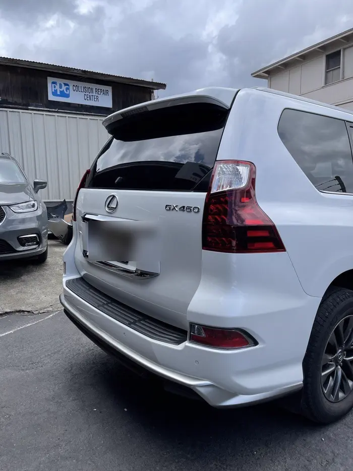 White Lexus GX460 SUV after bumper and panel repair